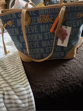 Steve Madden Blue Logo Tote with Tan Trim and Orange Charm
